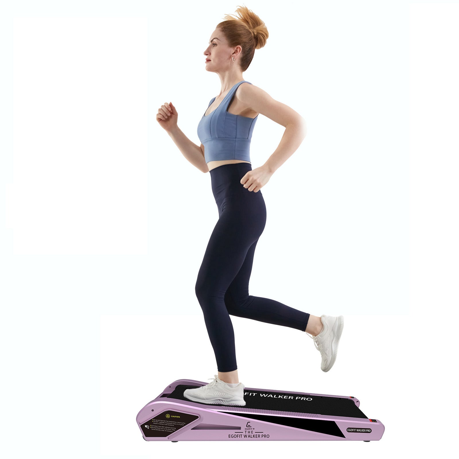 Sakura pink treadmill stored under couch – slim, space-saving design